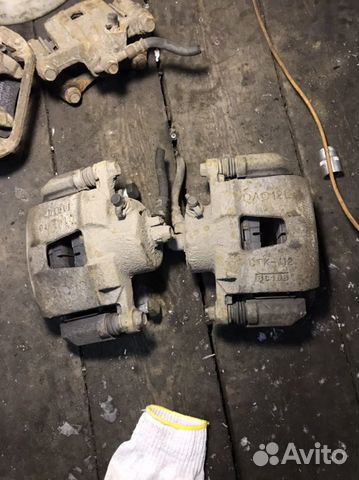 Суппорт передний правый Chevrolet Lacetti