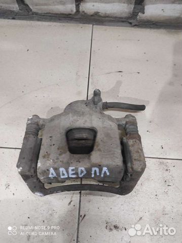 Суппорт передний левый Шевроле Авео т200 т250