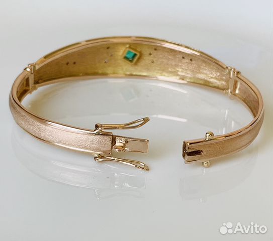 Золотой браслет с изумрудом и бриллиантами Золотой браслет с изумрудом и бриллиантами