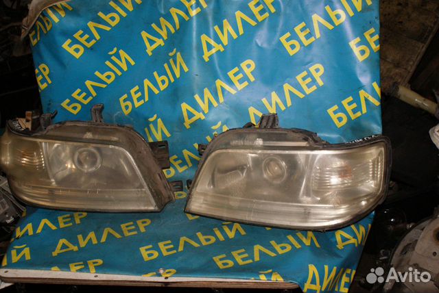 Фара Nissan Cube