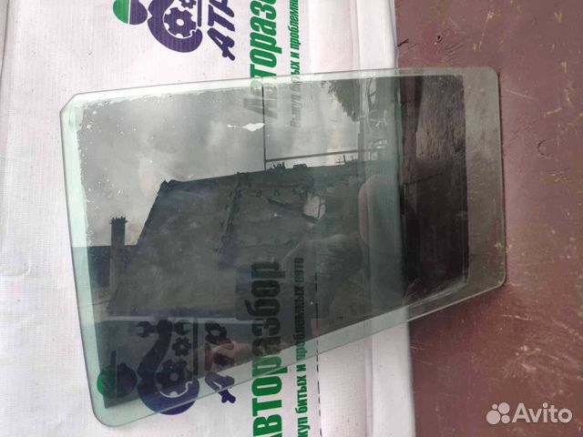 Стекло маленькое двери задней правой KIA Sportage