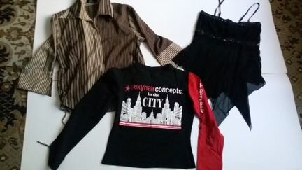 Блузки и кофточки