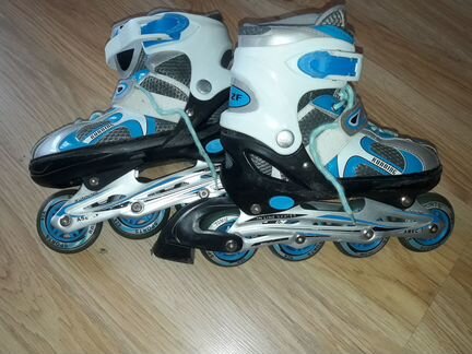 Роликовые коньки