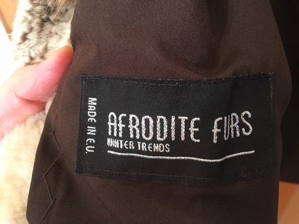 Жилетка из меха енота