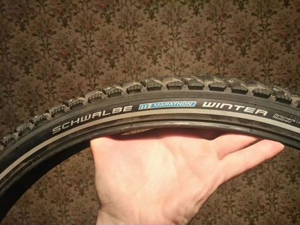 Покрышки зимние с шипами для велосипеда