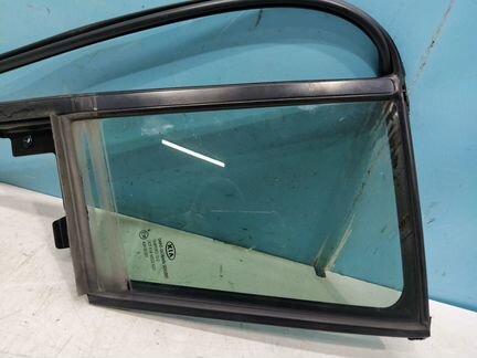 Стекло двери задней левой Kia Sportage 3 SL